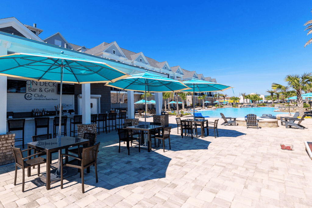 Outdoor tables and umbrellas at On Deck Bar and Grill